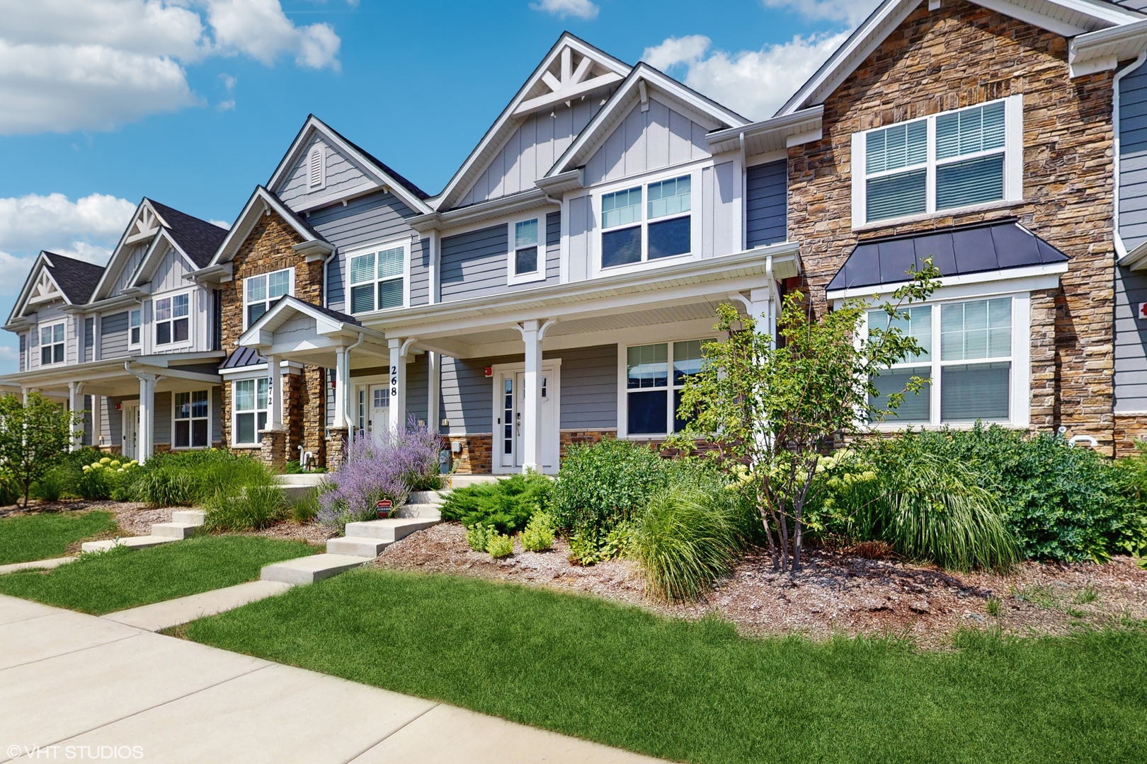 268 Hoffmann Drive, Unit 268 Buffalo Grove, IL 60089 - Photo 3 of 37 front view of a house with a yard