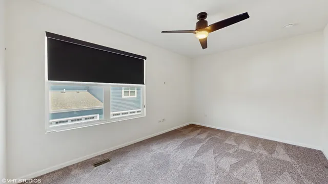 a view of front door and deck of the house