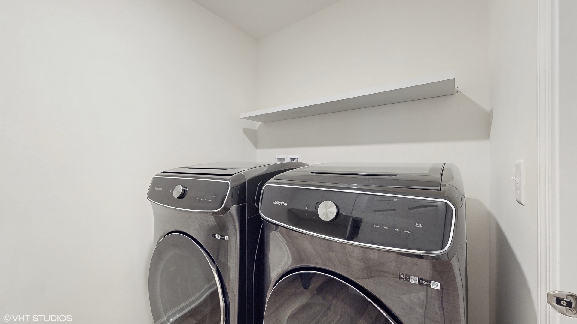 268 Hoffmann Drive, Unit 268 Buffalo Grove, IL 60089 - Photo 33 of 37 a utility room with dryer and washer