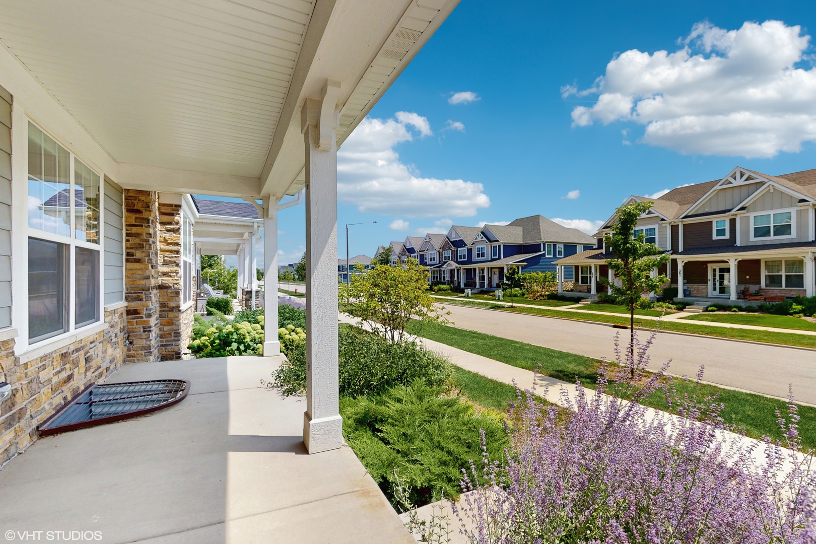268 Hoffmann Drive, Unit 268 Buffalo Grove, IL 60089 - Photo 4 of 37 a front view of a house with a yard table and chairs