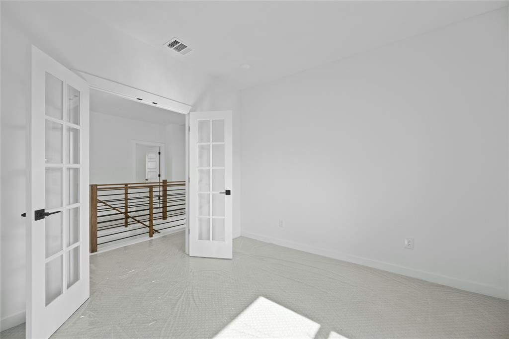 2121 Oak Haven Court Garland, TX 75044 - Photo 23 of 38 a view of an empty room