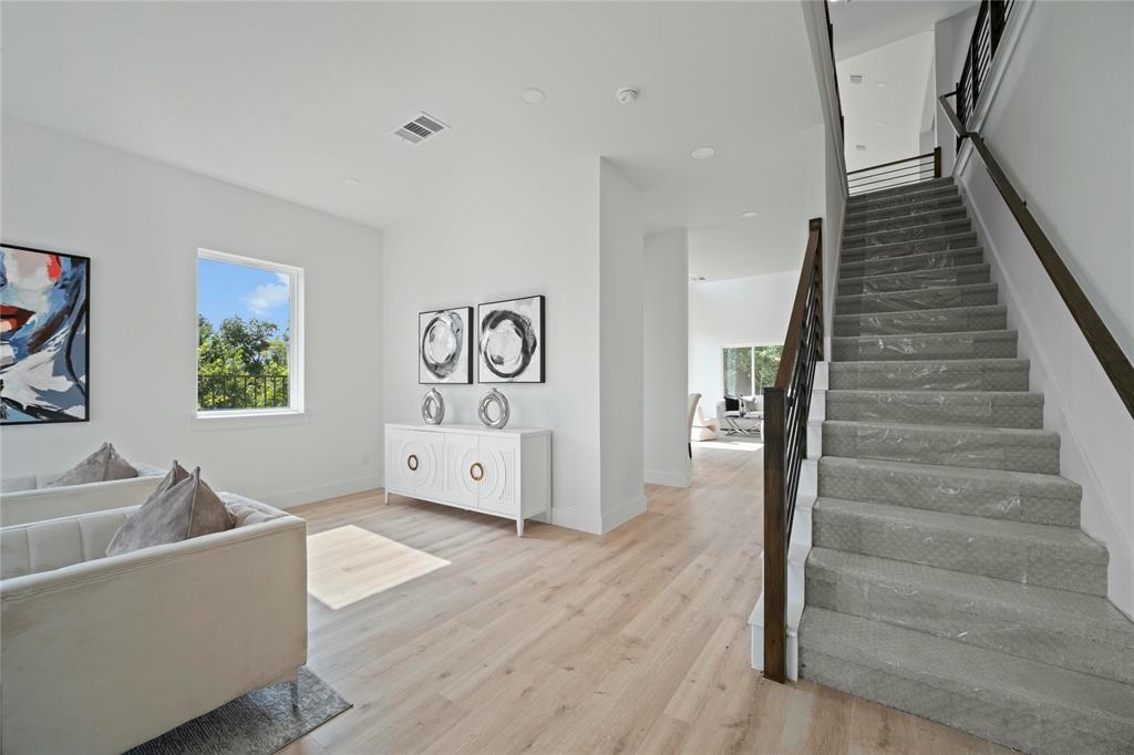 2121 Oak Haven Court Garland, TX 75044 - Photo 3 of 38 a living room with furniture and wooden floor