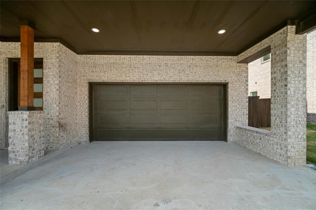 2121 Oak Haven Court Garland, TX 75044 - Photo 33 of 38 a view of an empty room with a fireplace