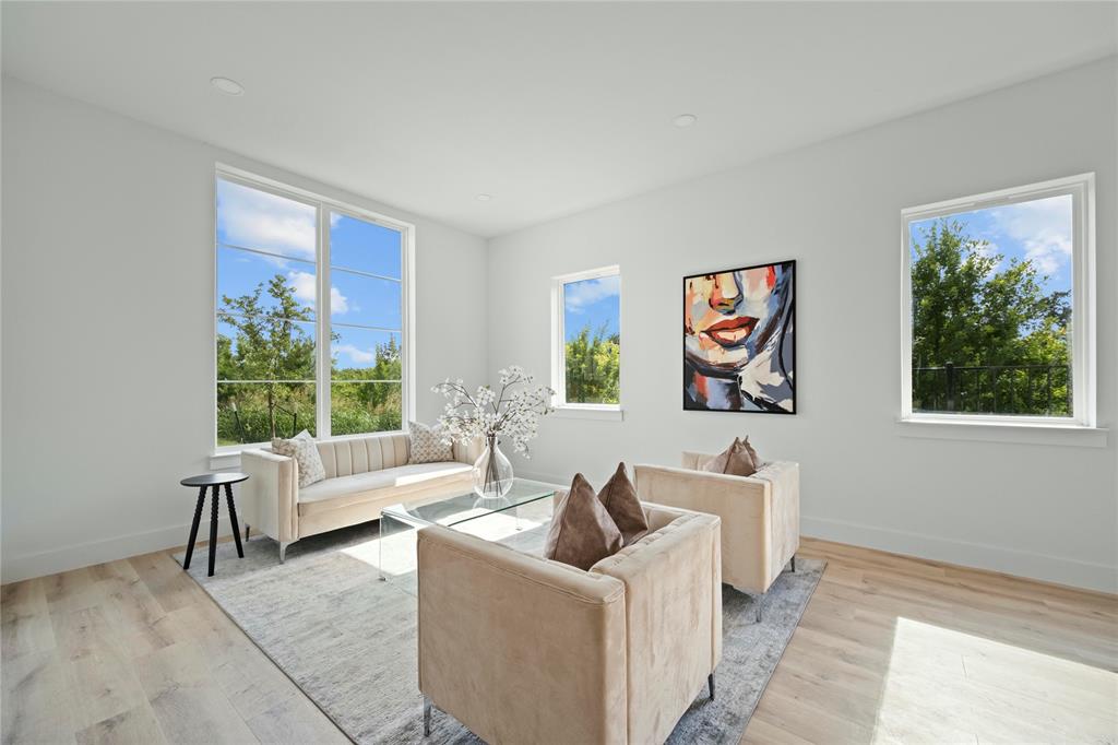 2121 Oak Haven Court Garland, TX 75044 - Photo 4 of 38 a living room with furniture and a large window