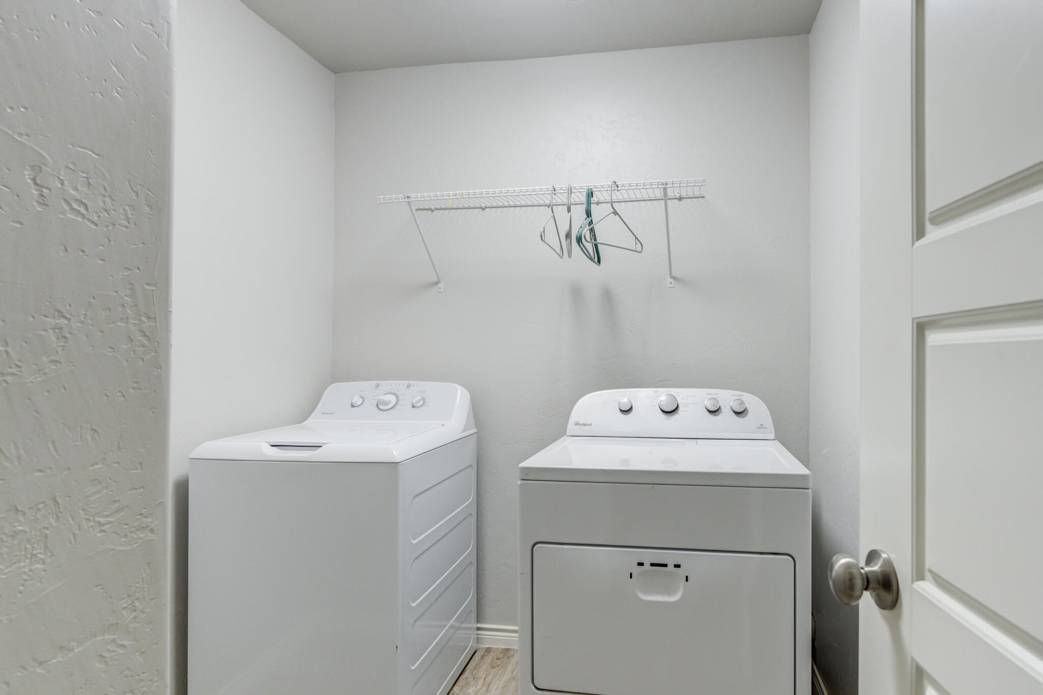 4320 52nd Street Lubbock, TX 79413 - Photo 22 of 59 a utility room with dryer and washer