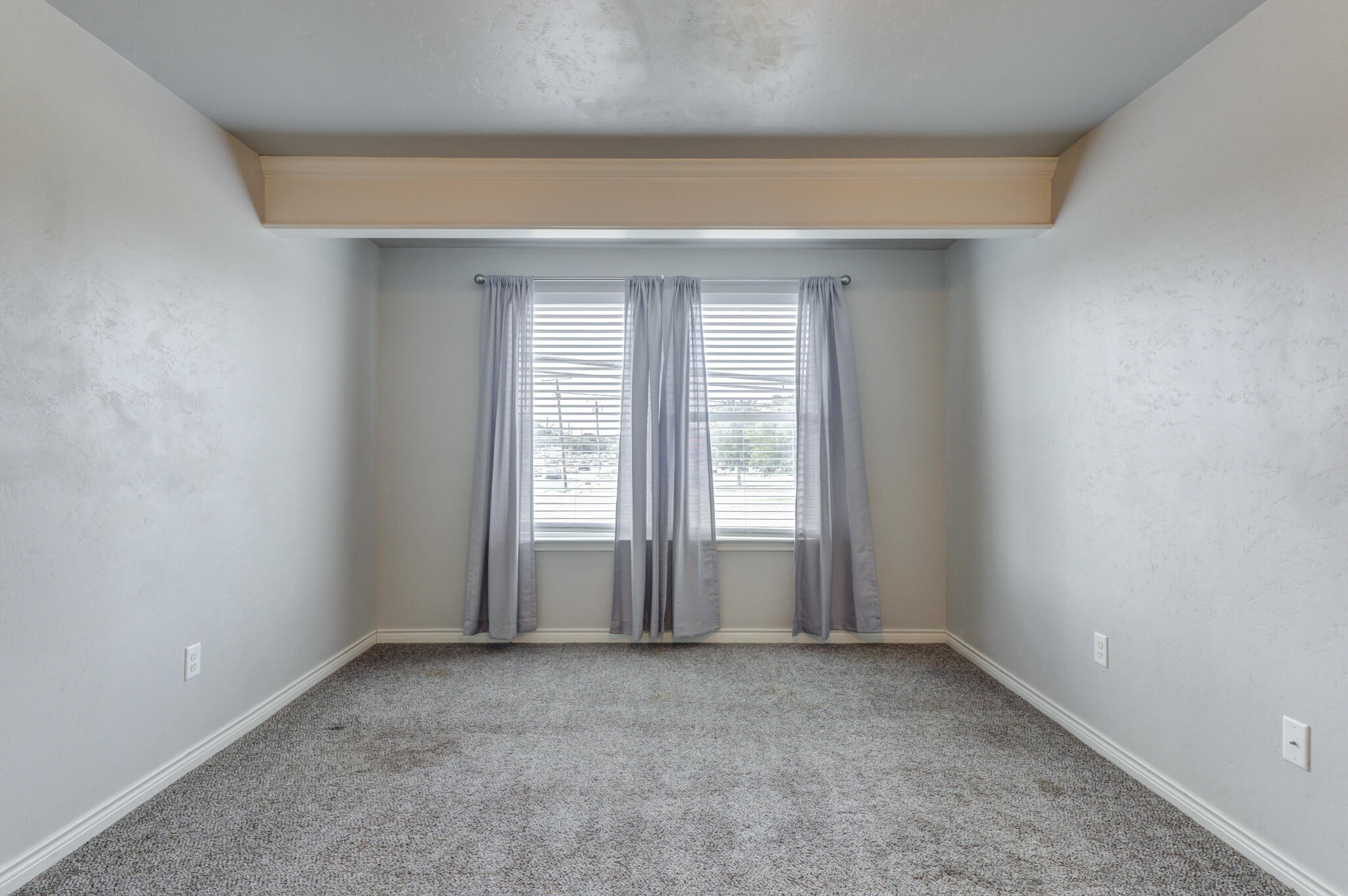 4320 52nd Street Lubbock, TX 79413 - Photo 30 of 59 an empty room with windows