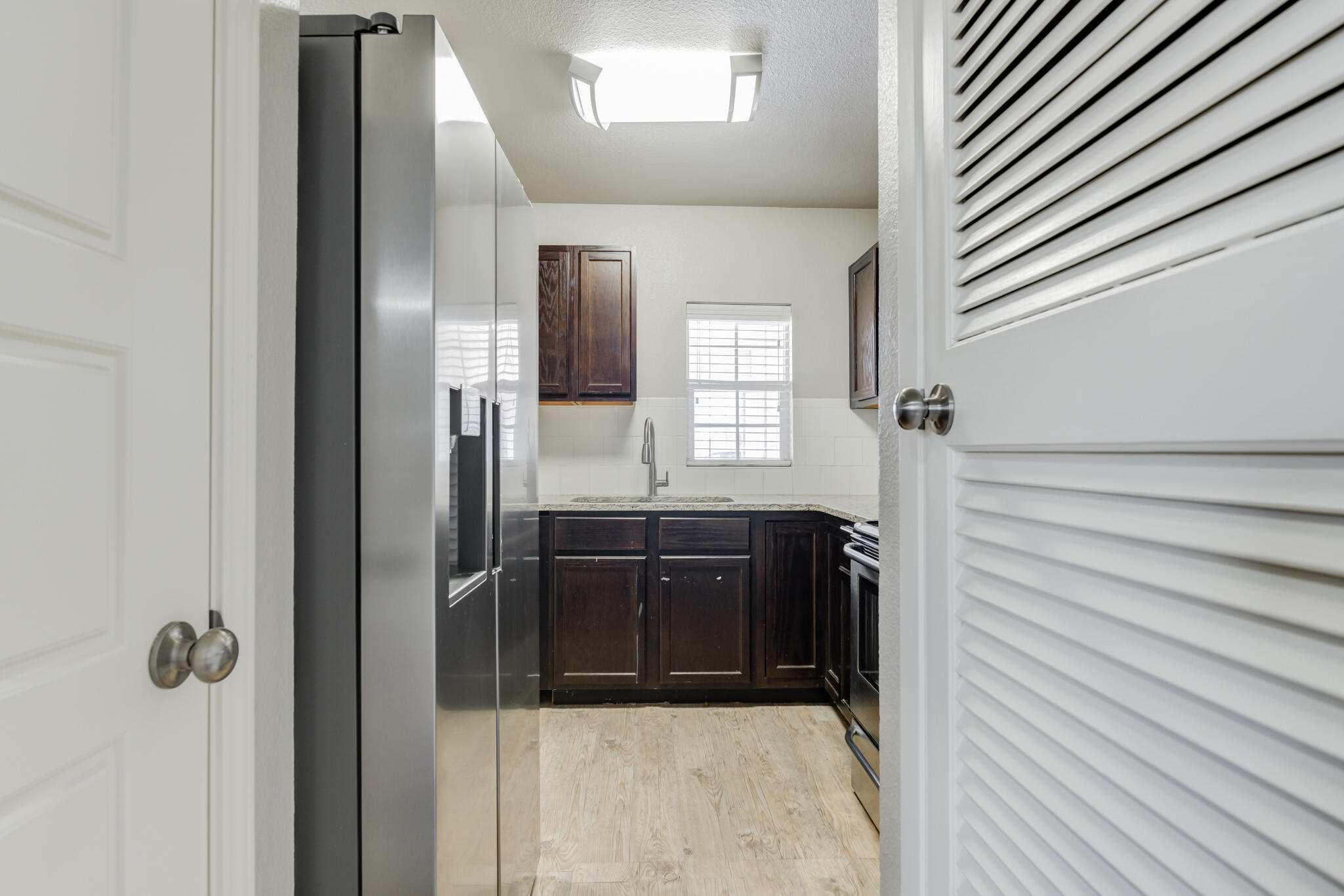 4320 52nd Street Lubbock, TX 79413 - Photo 41 of 59 a bathroom with a bathtub and a shower
