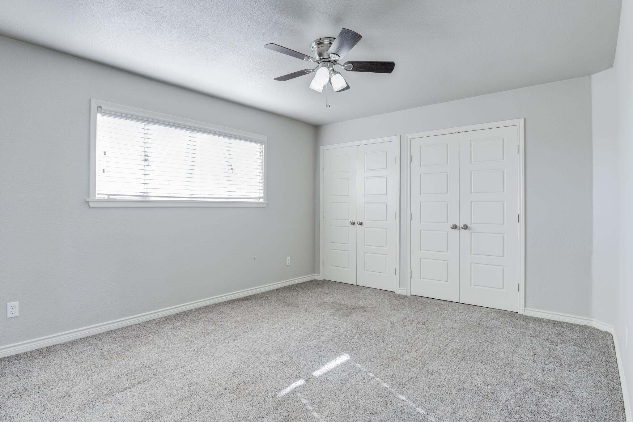 4320 52nd Street Lubbock, TX 79413 - Photo 47 of 59 a view of an empty room with a window