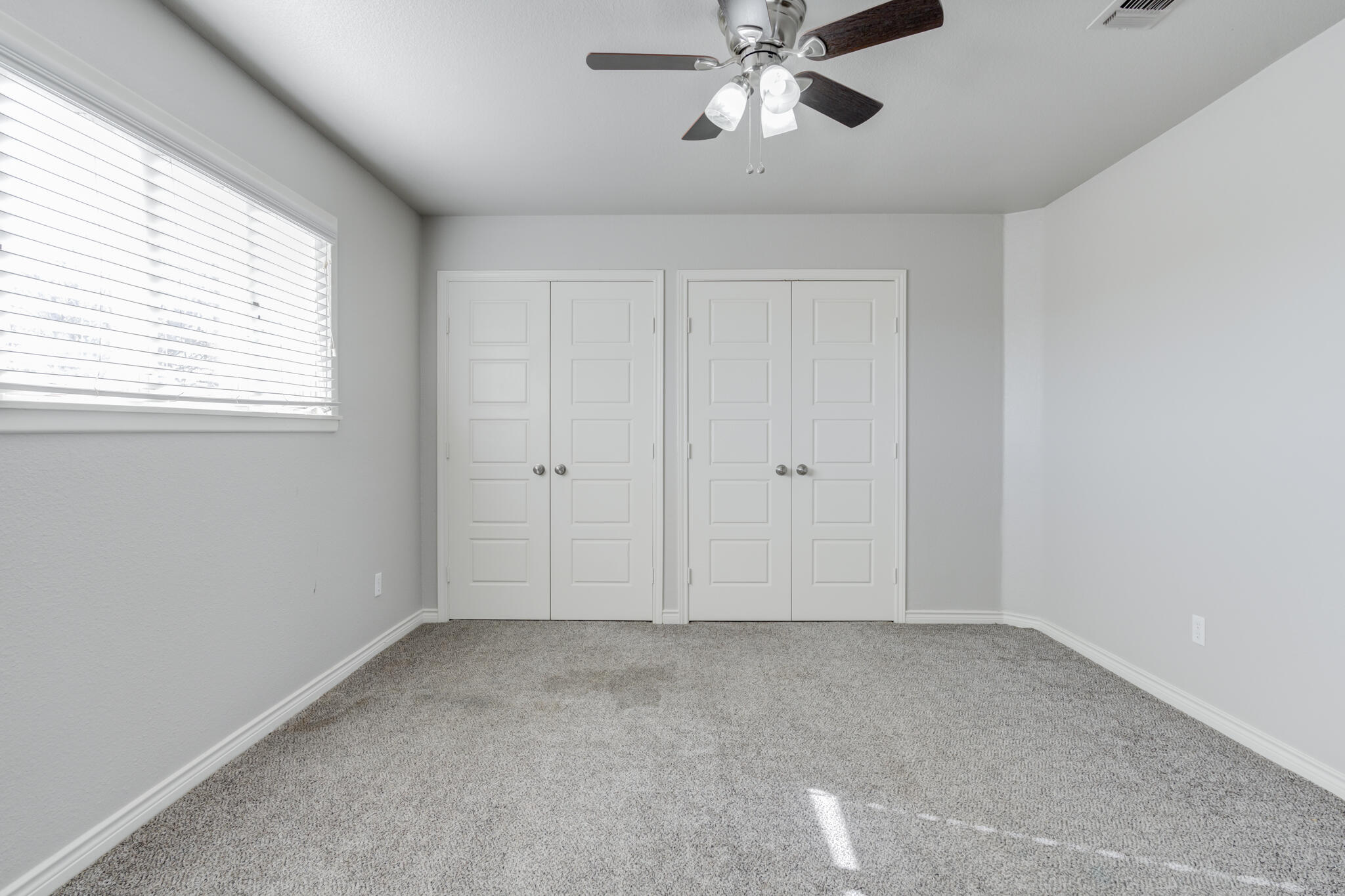4320 52nd Street Lubbock, TX 79413 - Photo 48 of 59 a view of an empty room with a window
