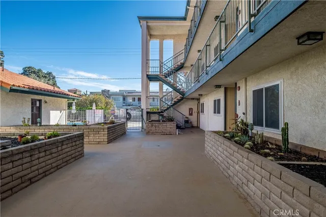 a view of balcony with wooden floor