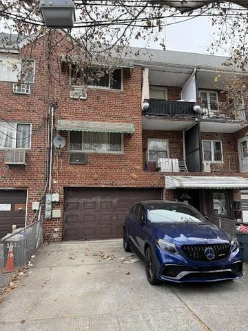 a car parked in front of a building