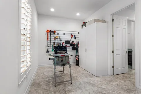a view of kitchen with furniture and window