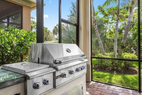 a view of barbeque grill with garden