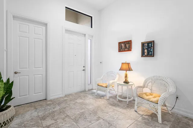 a room with furniture and gym equipment