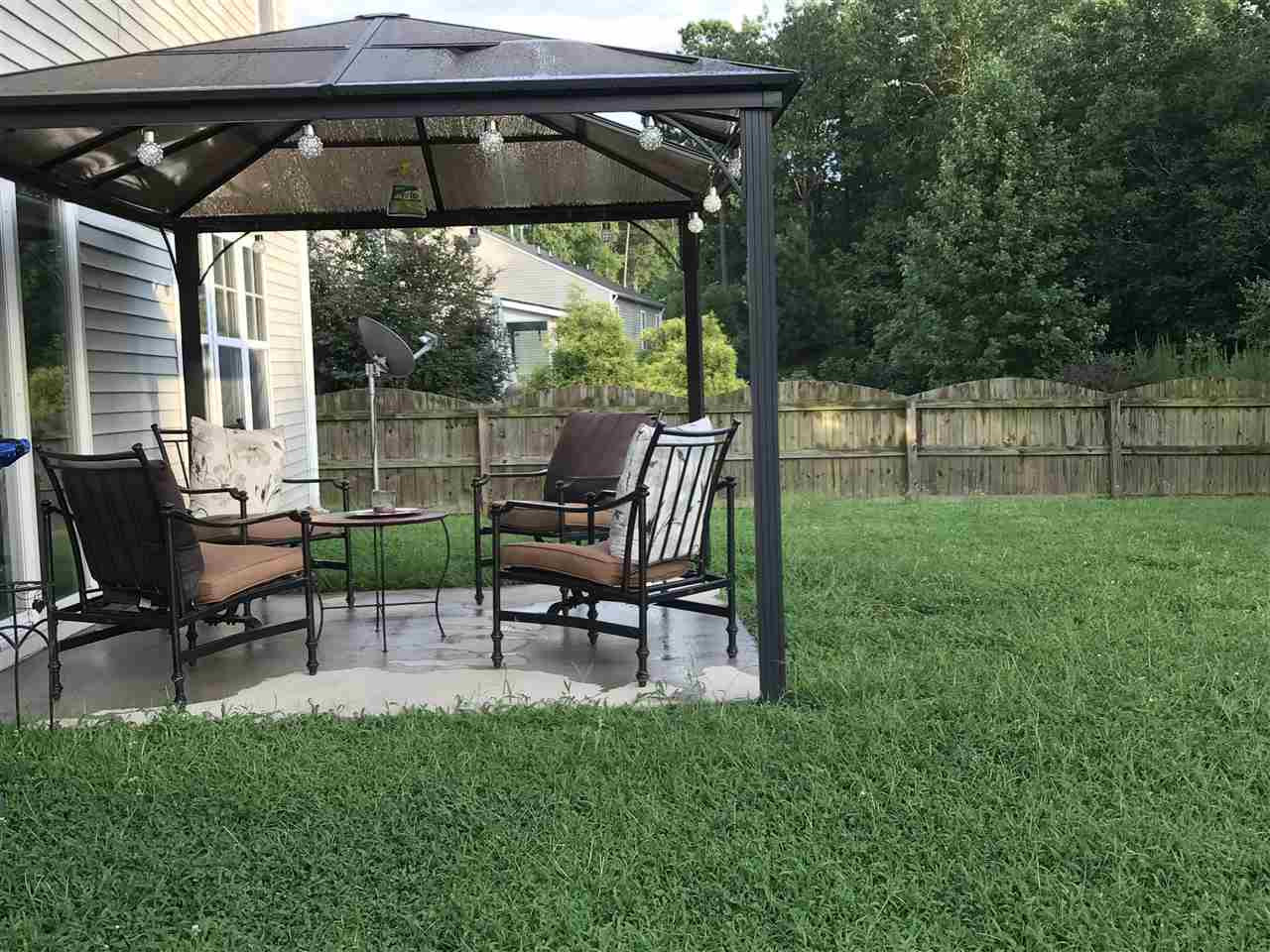 4262 Offshore Drive Raleigh, NC 27610 - Photo 20 of 23 Picture yourself entertaining in the peace and serenity of this large backyard Exterior Back