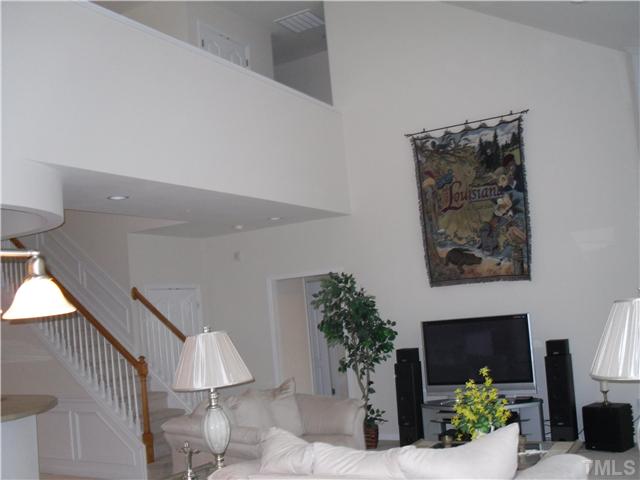8140 Sommerwell Street Raleigh, NC 27613 - Photo 8 of 23 Family Room/Balcony