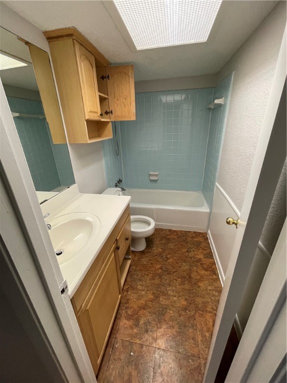 1725 Toomey Road, Unit 307 Austin, TX 78704 - Photo 10 of 12 a bathroom with a sink a toilet and shower