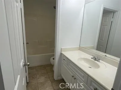 a bathroom with a bathtub a toilet and a shower