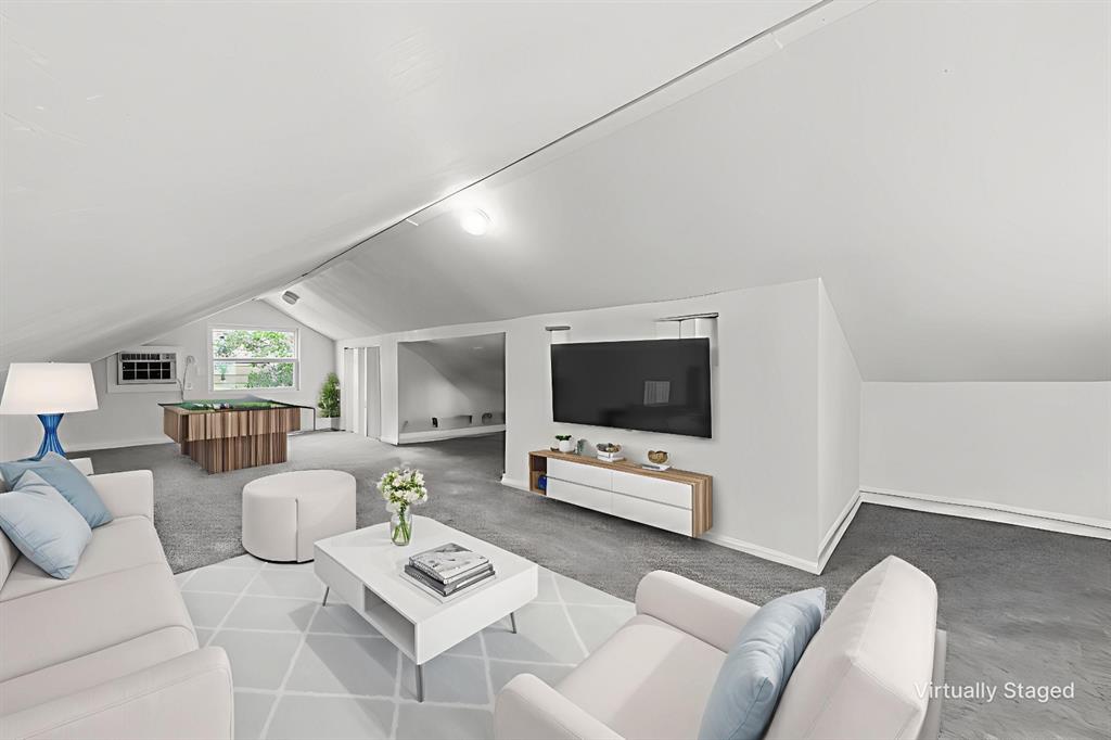 1205 Ashleman Street Bellmead, TX 76705 - Photo 29 of 33 a living room with furniture and a flat screen tv