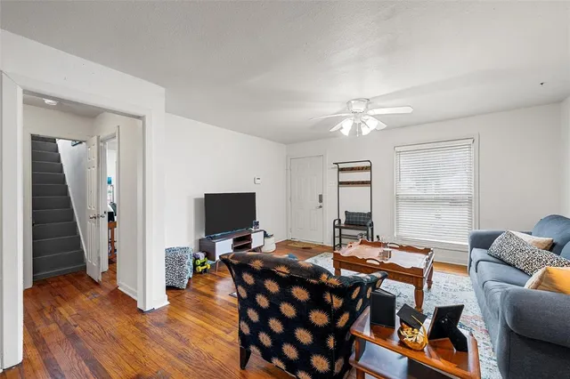 a workspace with furniture and wooden floor