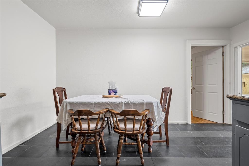 1205 Ashleman Street Bellmead, TX 76705 - Photo 8 of 33 a view of a dining room with furniture and window