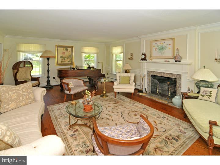 7 Andorra Hill Road Lafayette Hill, PA 19444 - Photo 7 of 23 a living room with furniture and a fireplace