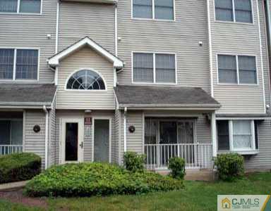 417 Edpas Road New Brunswick, NJ 08901 - Photo 1 of 2 a front view of a house with garden