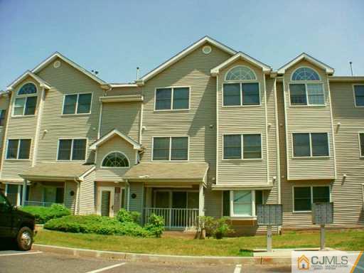417 Edpas Road New Brunswick, NJ 08901 - Photo 2 of 2 a front view of a house with a yard