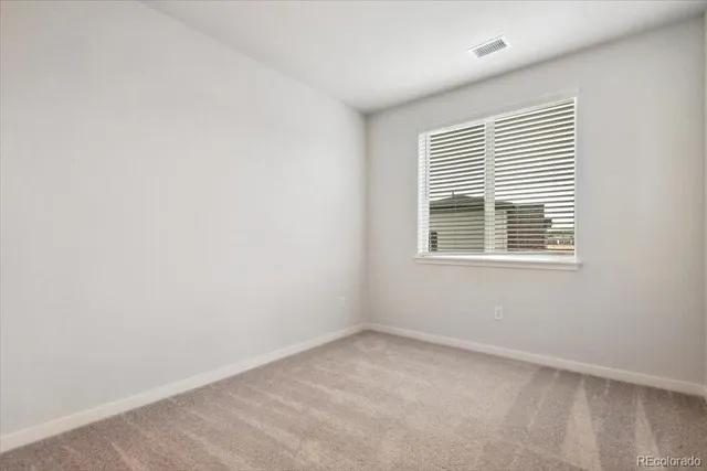 an empty room with closet