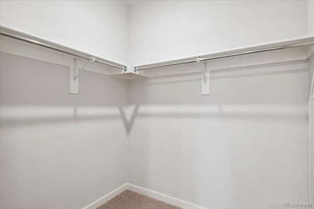a view of a balcony with wooden floor
