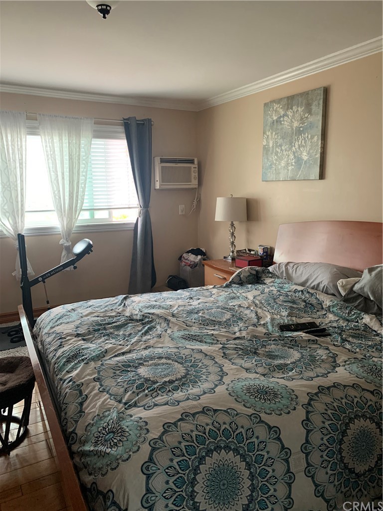 23625 Pineforest Lane Harbor City, CA 90710 - Photo 15 of 22 a bed sitting in a bedroom next to a window