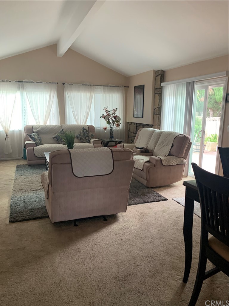 23625 Pineforest Lane Harbor City, CA 90710 - Photo 6 of 22 a living room with furniture and a large window