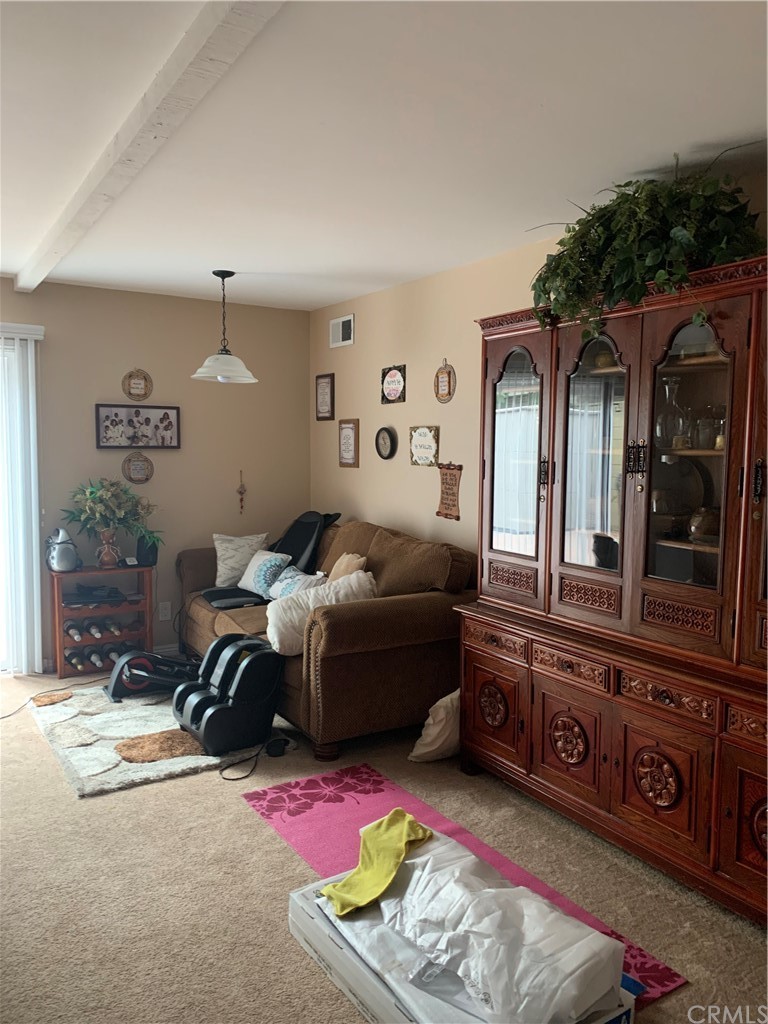 23625 Pineforest Lane Harbor City, CA 90710 - Photo 8 of 22 a bedroom with furniture and a window