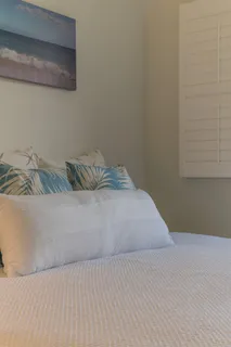 a kitchen with a refrigerator and a stove