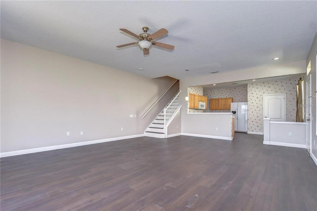 4744 Pond Ridge Drive Riverview, FL 33578 - Photo 10 of 18 a view of an empty room and wooden floor