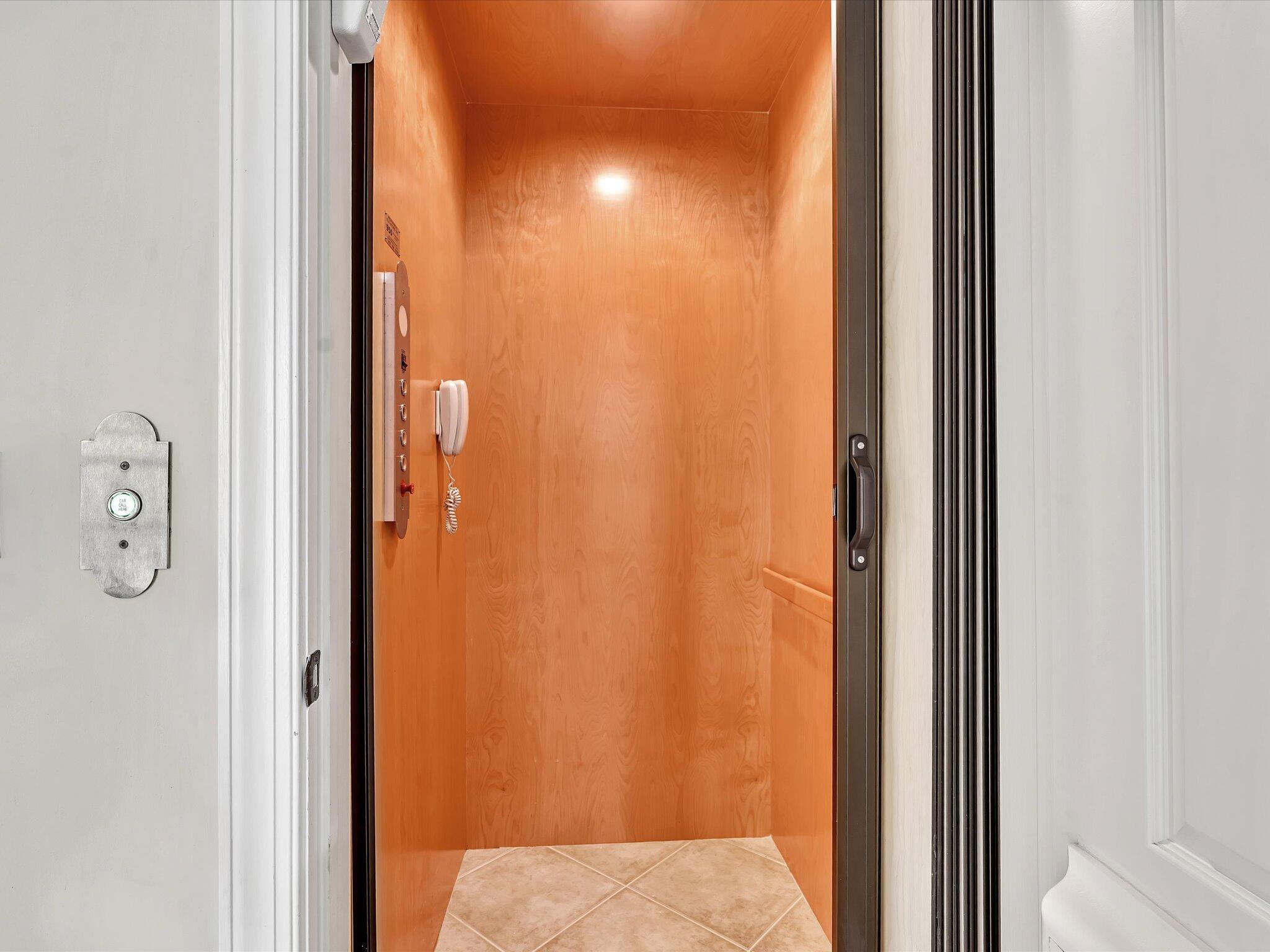 5575 Northeast Trieste Way Boca Raton, FL 33487 - Photo 32 of 38 Elevator