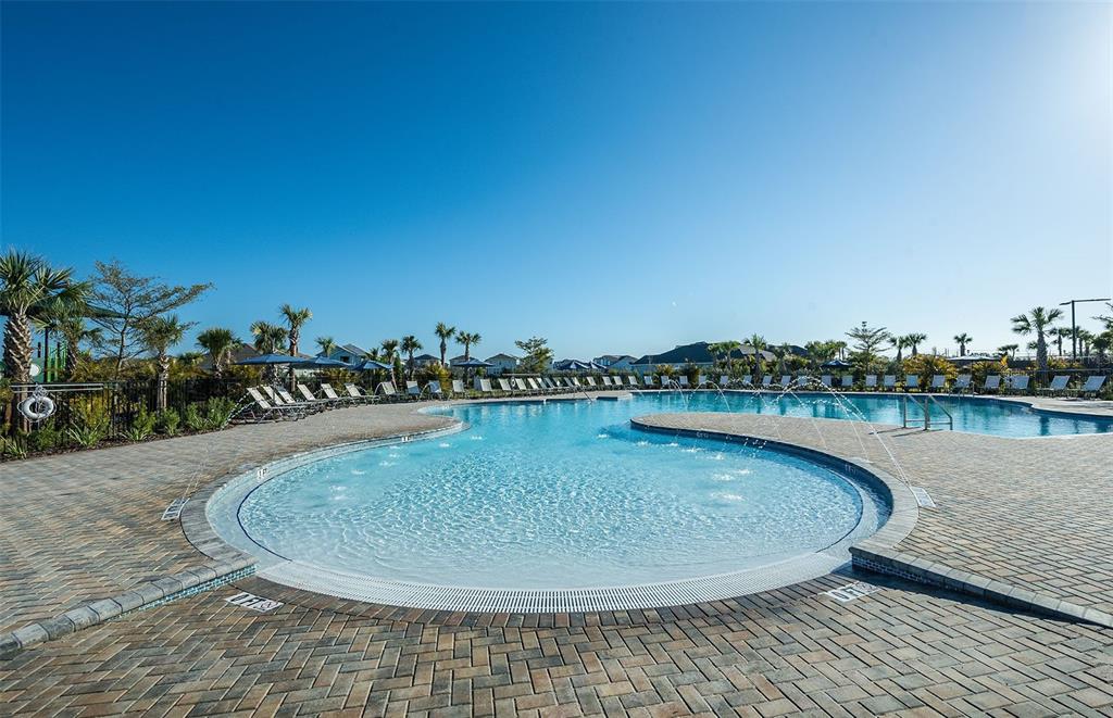5342 Spring Maiden Circle Apollo Beach, FL 33572 - Photo 20 of 25 a view of a lake with a outdoor space