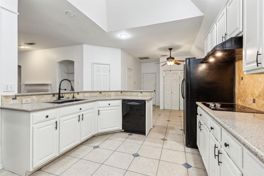 400 Moss Hill Road Irving, TX 75063 - Photo 11 of 26 Oversized Kitchen Sink and Two-tiered Island