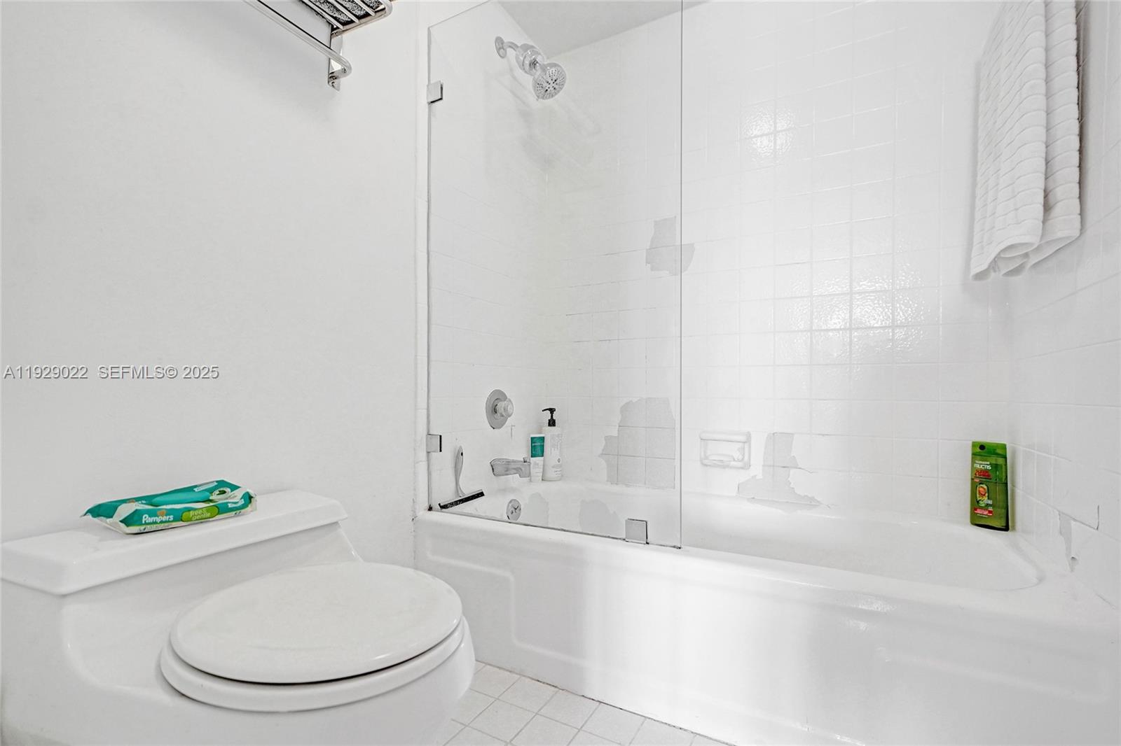 600 Northeast 36th Street, Unit 218 Miami, FL 33137 - Photo 7 of 31 a bathroom with a sink a toilet and bathtub