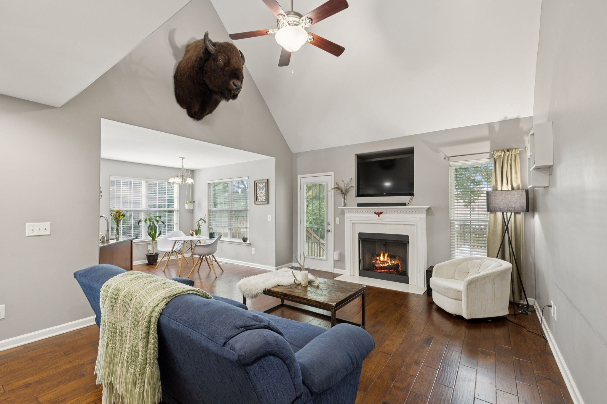 1062 Golf View Way Spring Hill, TN 37174 - Photo 1 of 42 a living room with furniture a fireplace and a flat screen tv