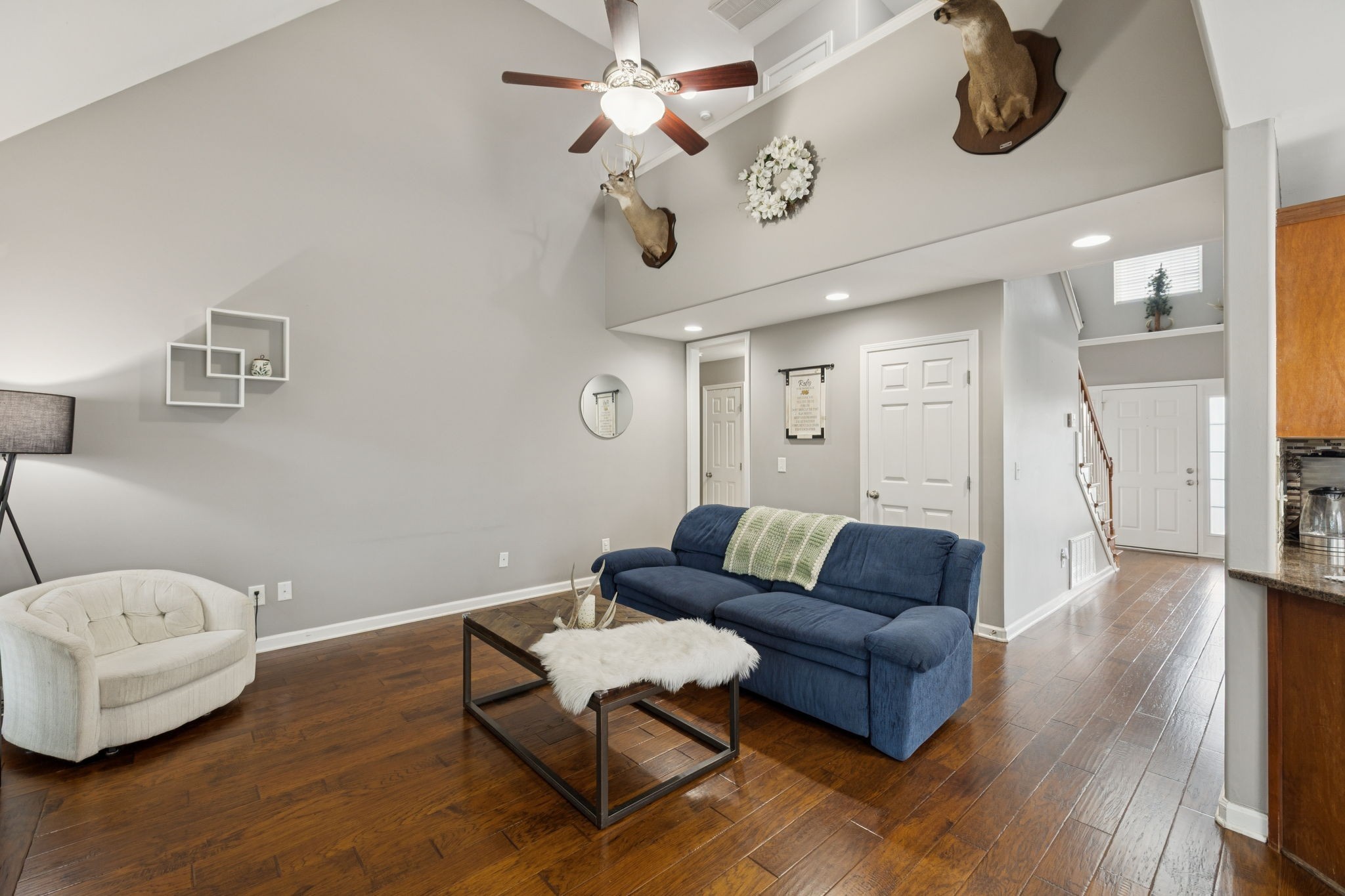 1062 Golf View Way Spring Hill, TN 37174 - Photo 11 of 42 a living room with furniture and wooden floor