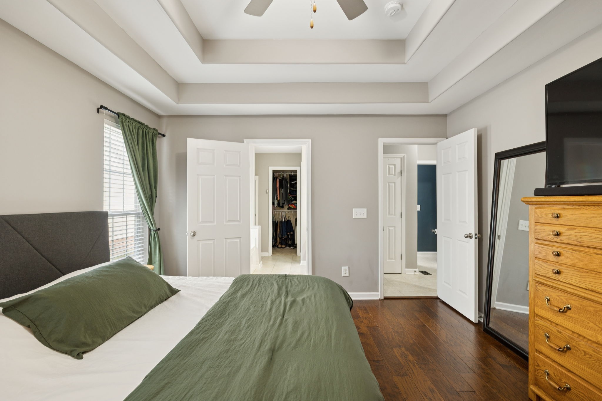 1062 Golf View Way Spring Hill, TN 37174 - Photo 22 of 42 a bedroom with a bed and a television