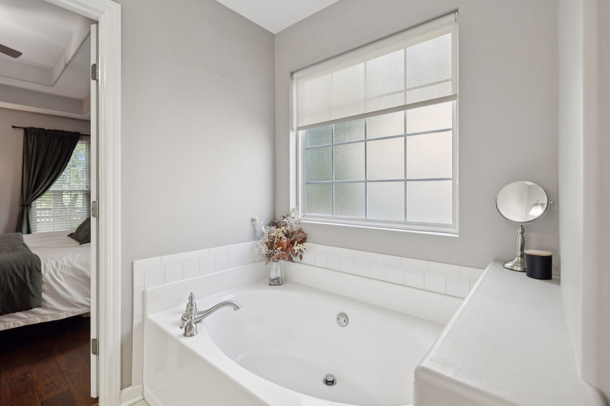 1062 Golf View Way Spring Hill, TN 37174 - Photo 25 of 42 a white bath tub sitting next to a window