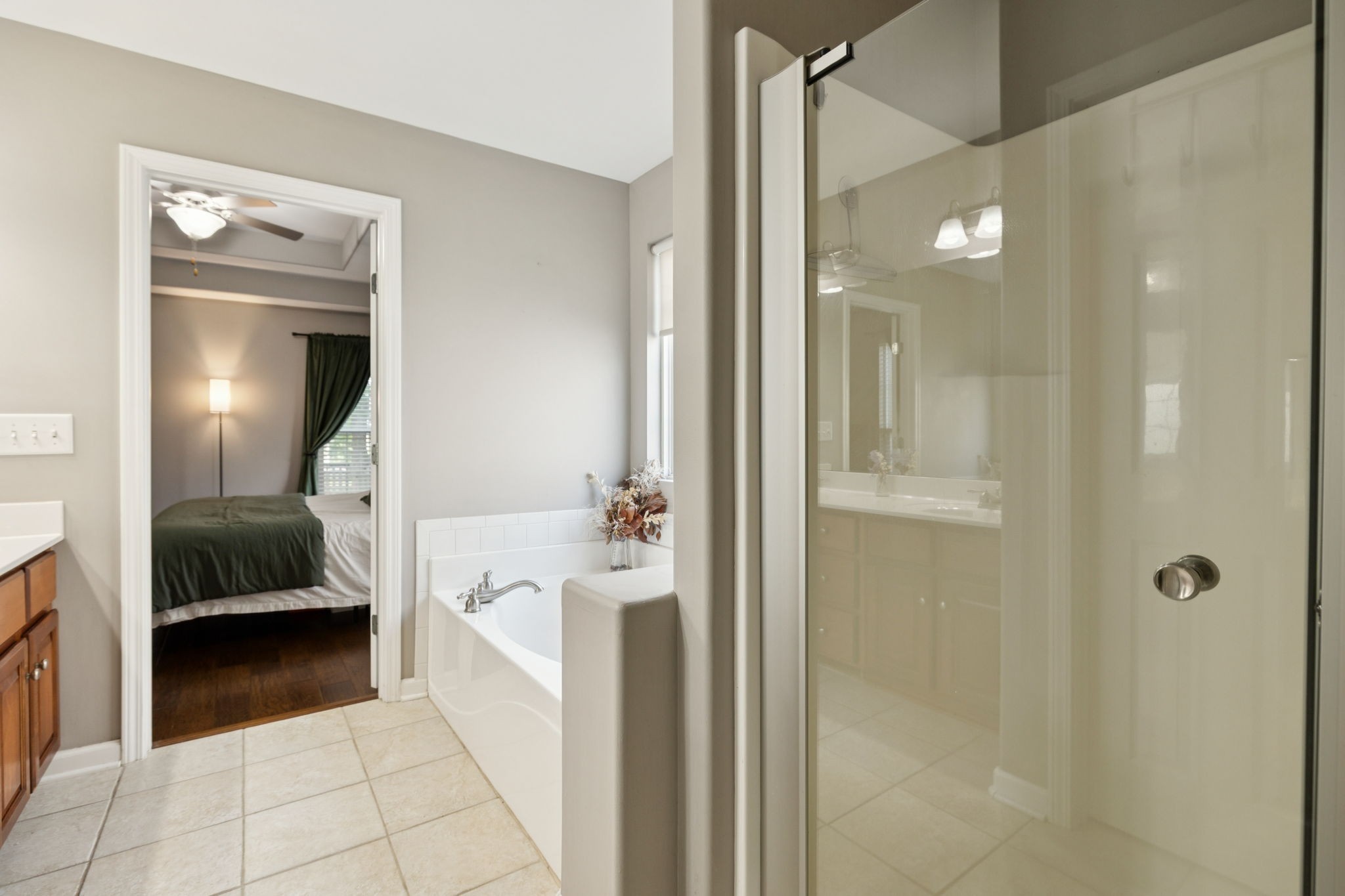 1062 Golf View Way Spring Hill, TN 37174 - Photo 26 of 42 a en suite bathroom with a sink and a mirror