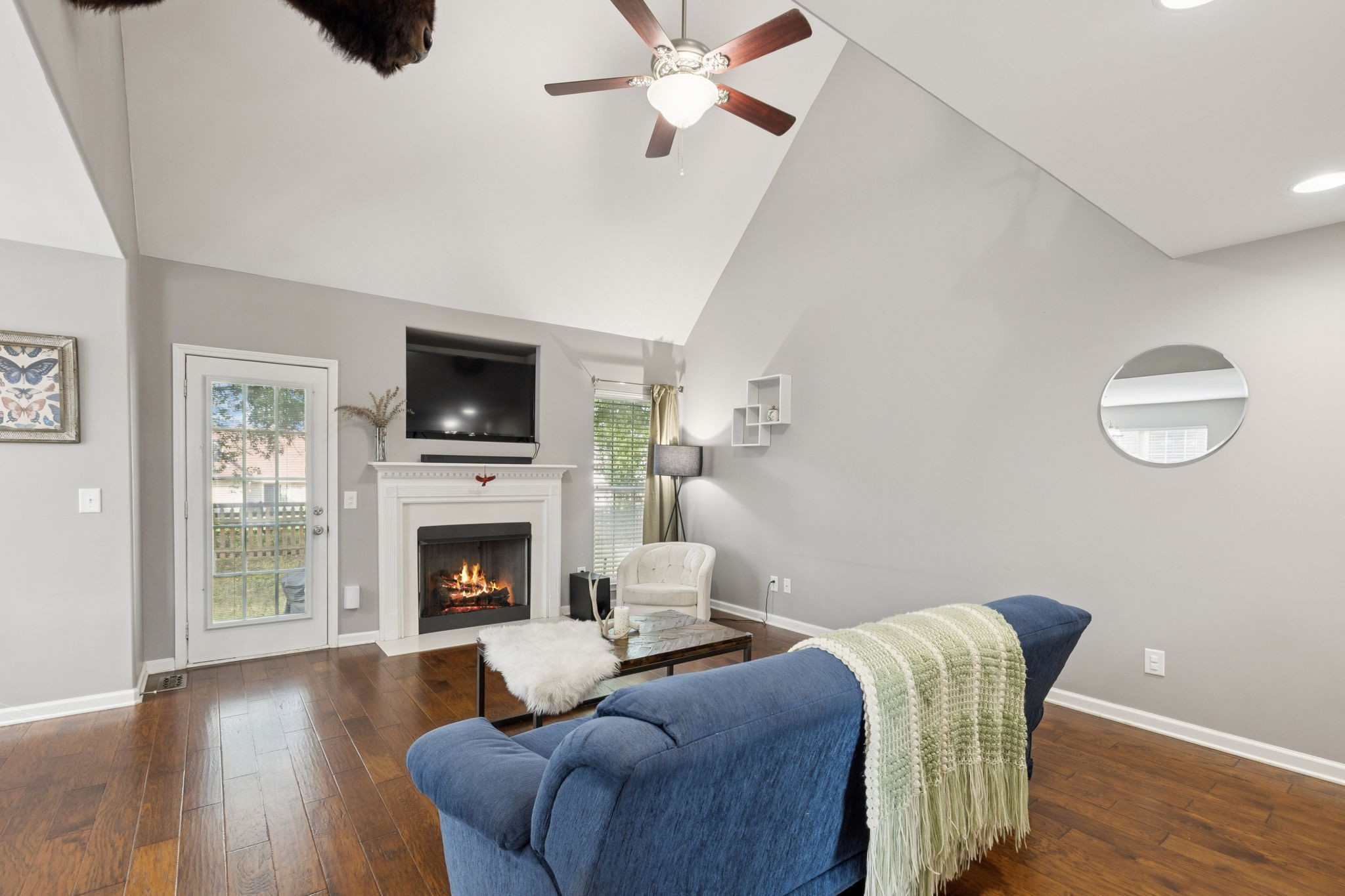 1062 Golf View Way Spring Hill, TN 37174 - Photo 3 of 42 a living room with furniture and a fireplace