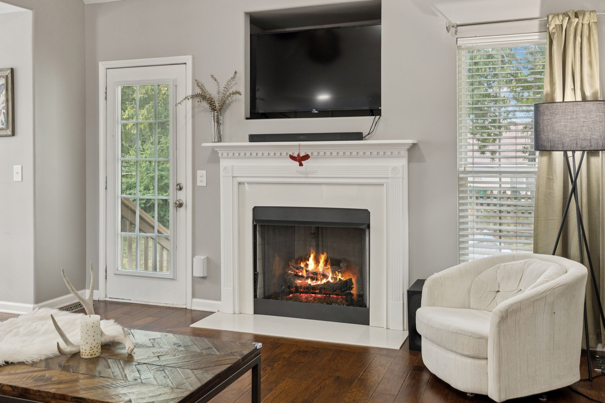 1062 Golf View Way Spring Hill, TN 37174 - Photo 7 of 42 a living room with furniture and a fireplace