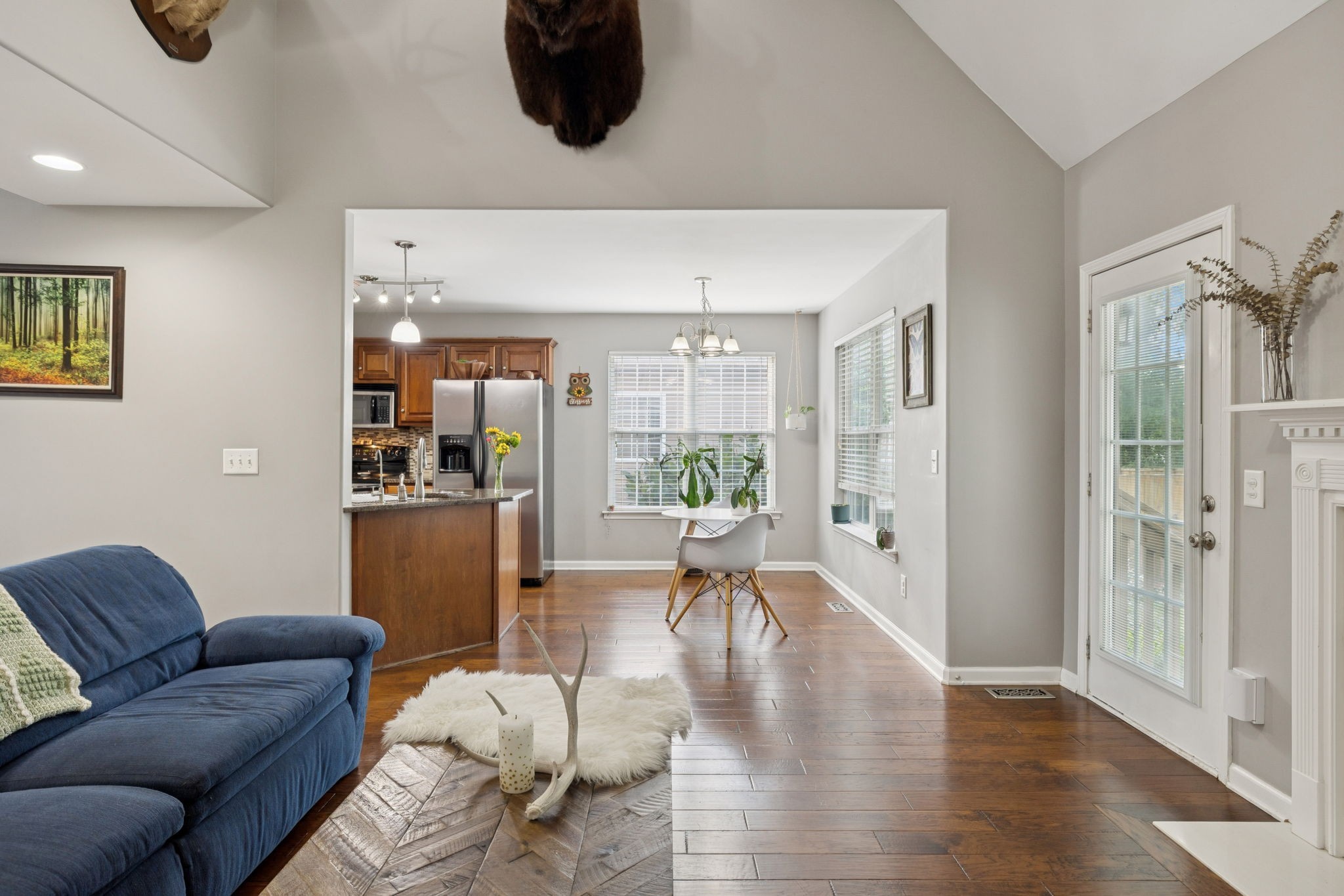 1062 Golf View Way Spring Hill, TN 37174 - Photo 9 of 42 a living room with furniture and a wooden floor
