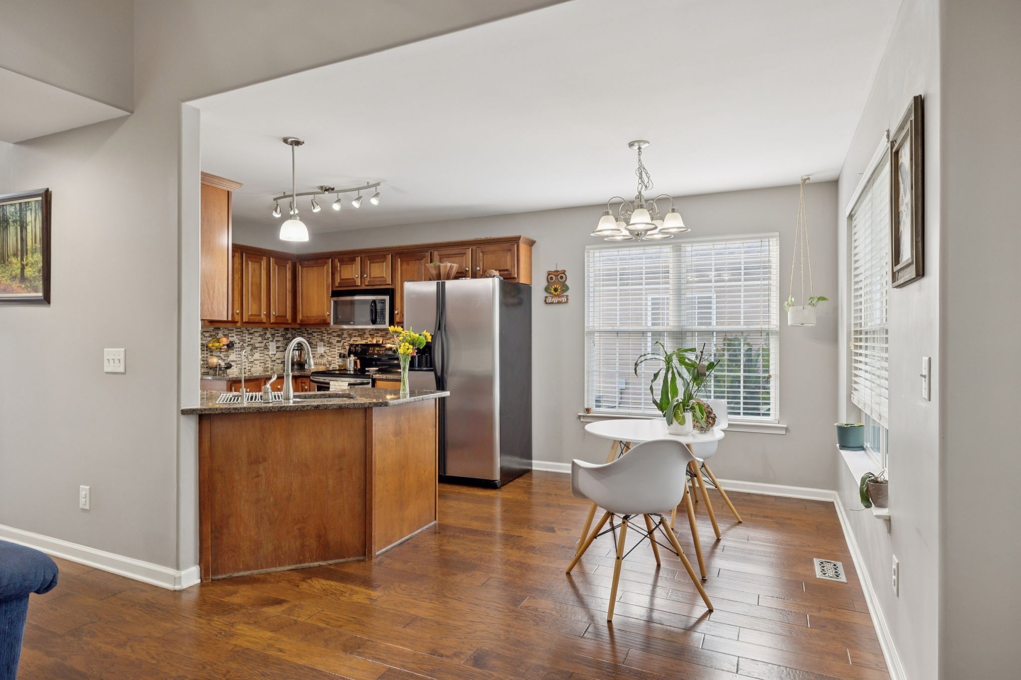1062 Golf View Way Spring Hill, TN 37174 - Photo 10 of 42 a kitchen with a table and chairs in it