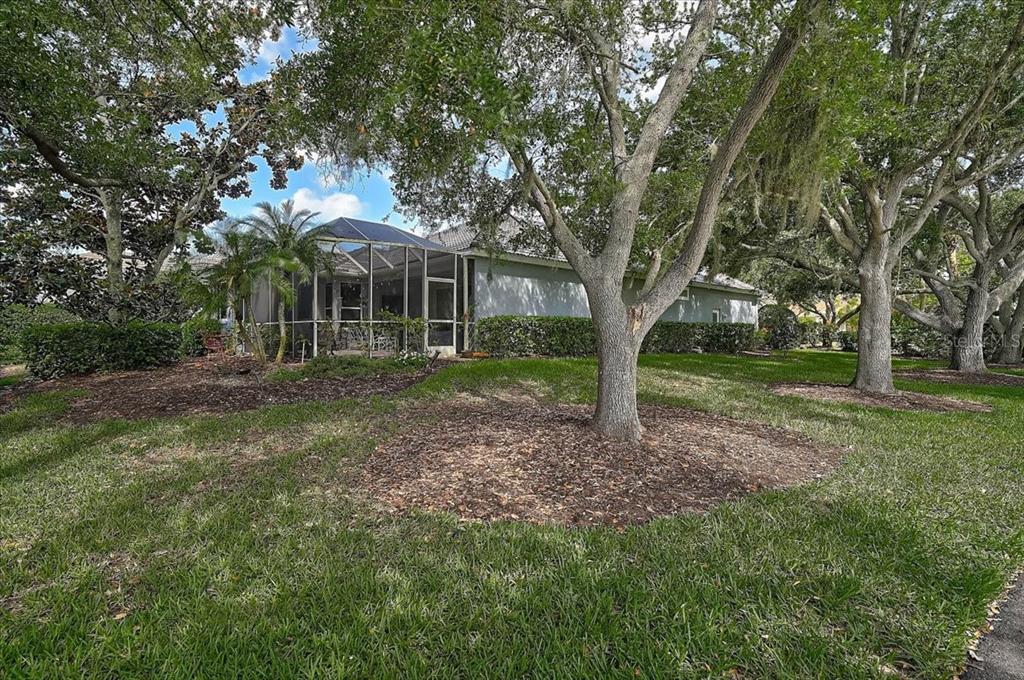 103 Bishopscourt Road Osprey, FL 34229 - Photo 26 of 55 a view of a house with yard and sitting area