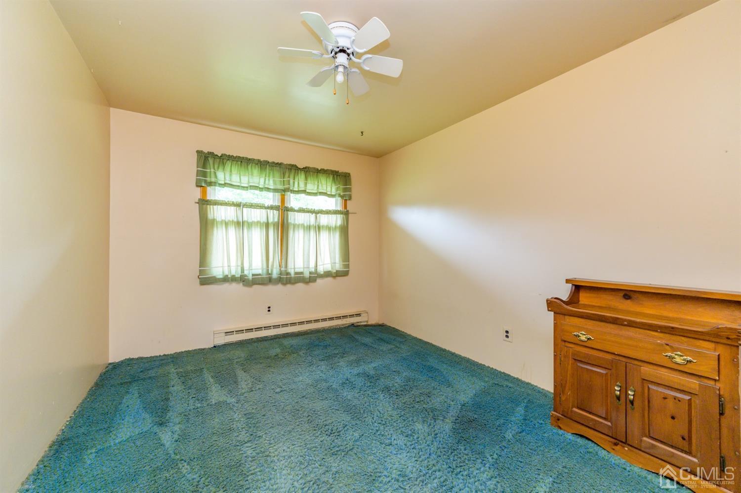 286 Barbertown Point Breeze Road Frenchtown, NJ 08825 - Photo 21 of 36 an empty room with windows